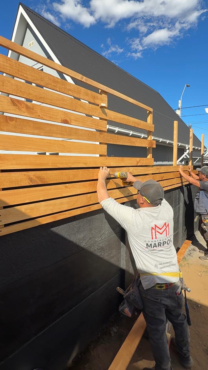 Proyecto 11 Constructora Marpol - Cortavista en patio de vivienda